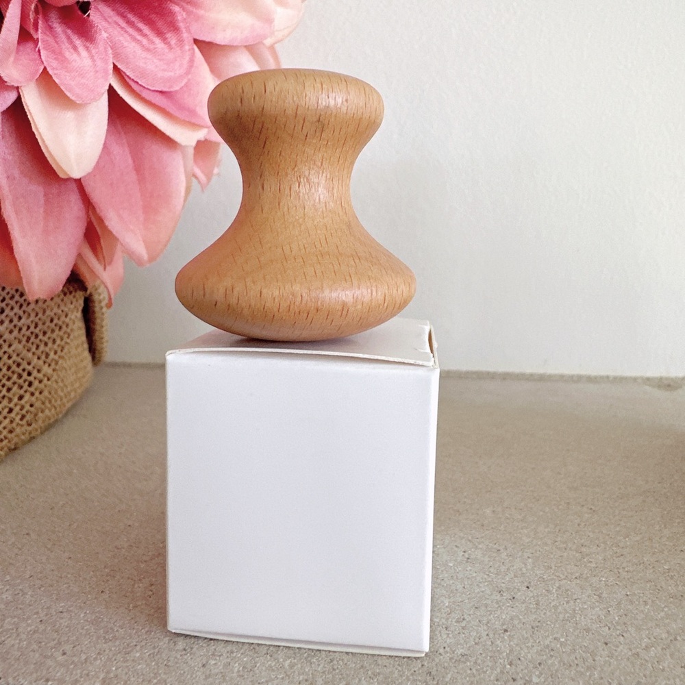New Origins wood eye massage tool